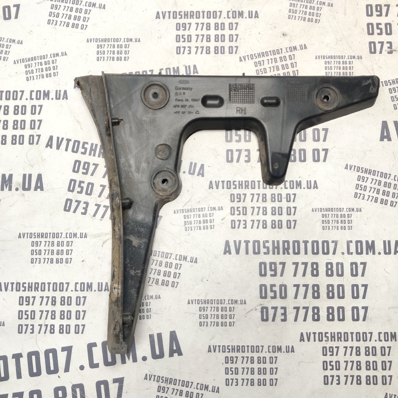 Кронштейн бампера Audi A6 C6 04-11 задня права OEM 4f9807454
