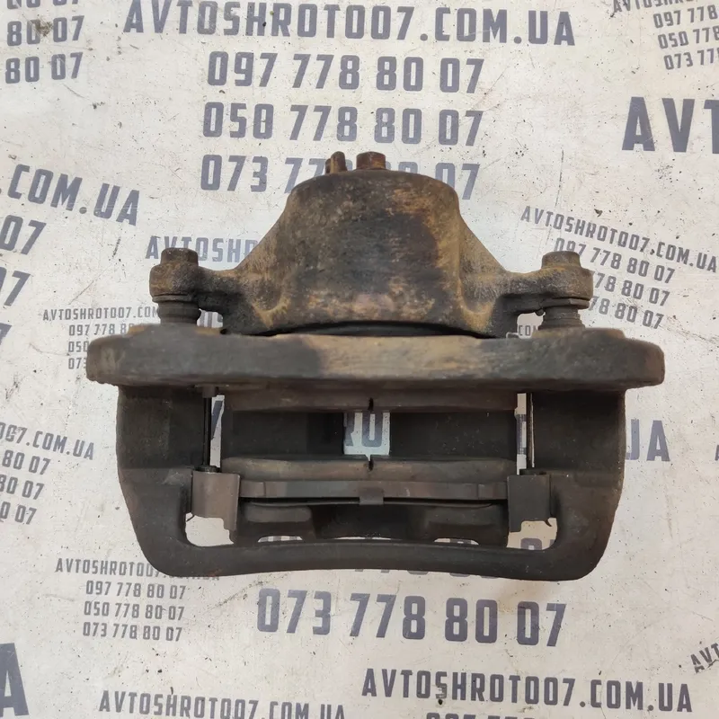 Тормозний супорт Hyundai Sonata IV (98-05) 2.0 перед. лівий