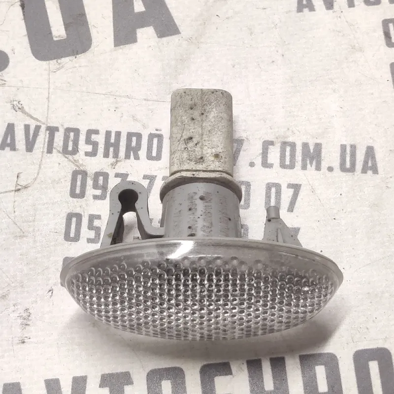 Поворотник Peugeot Partner 1 (96-08) 1.4 лівий OEM 0434554C
