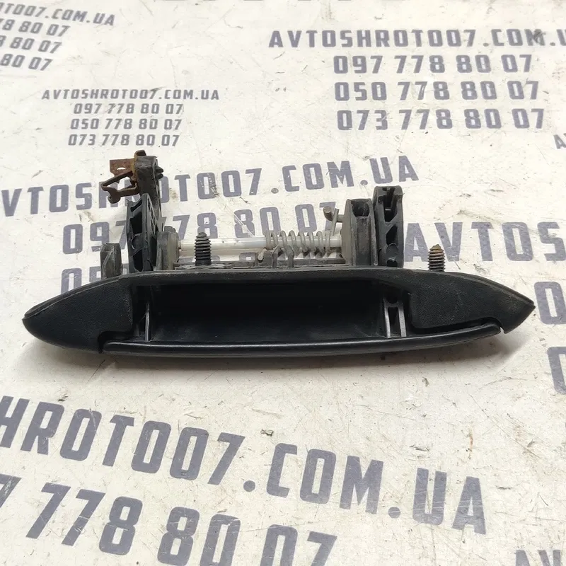 Ручка зовнішня Dacia Logan (04-12) 1.6 ліва OEM 7700433075