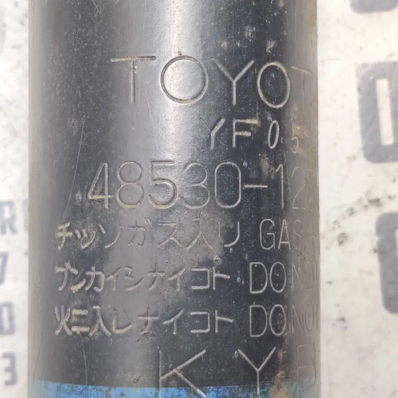 Амортизатор Toyota Corolla 06-13 1.6 задній OEM 4853012051