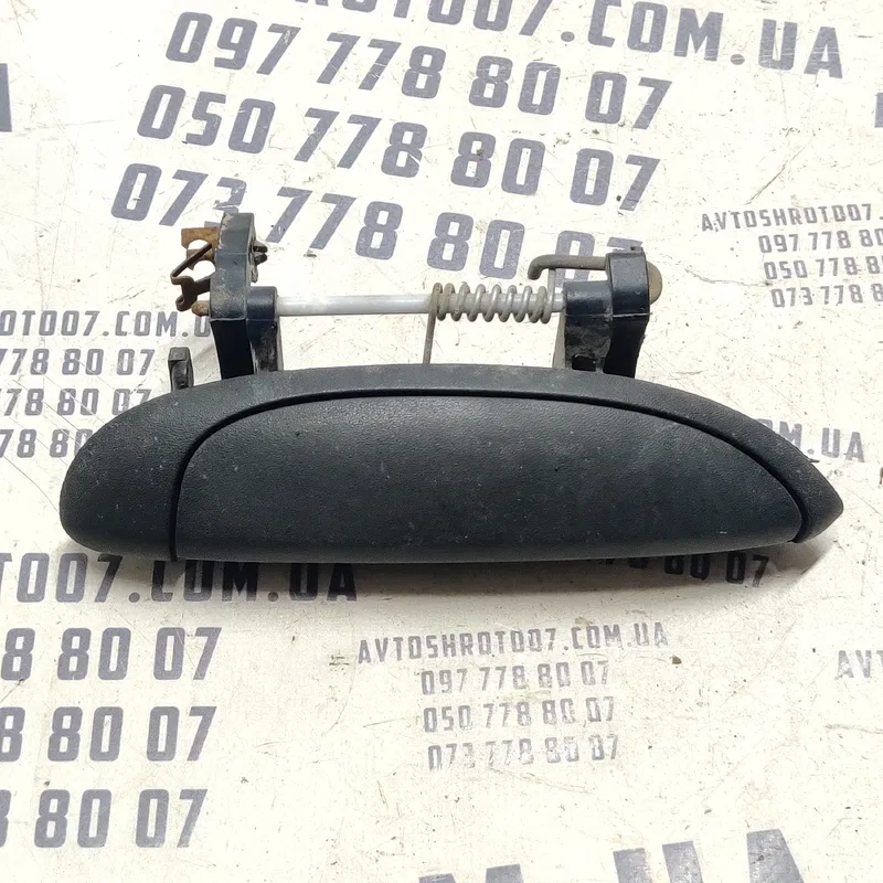 Ручка зовнішня Dacia Logan (04-12) 1.6 ліва OEM 7700433076