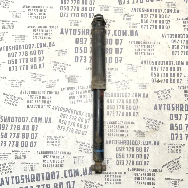 Амортизатор Toyota Corolla 06-13 1.6 задній OEM 4853012051