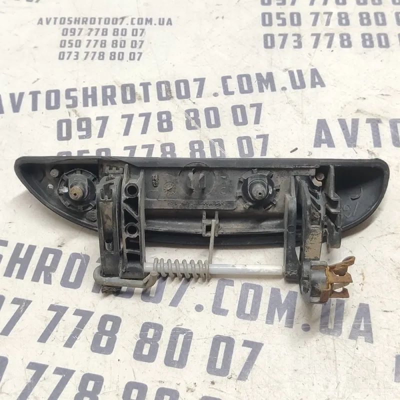 Ручка зовнішня Dacia Logan (04-12) 1.6 ліва OEM 7700433075
