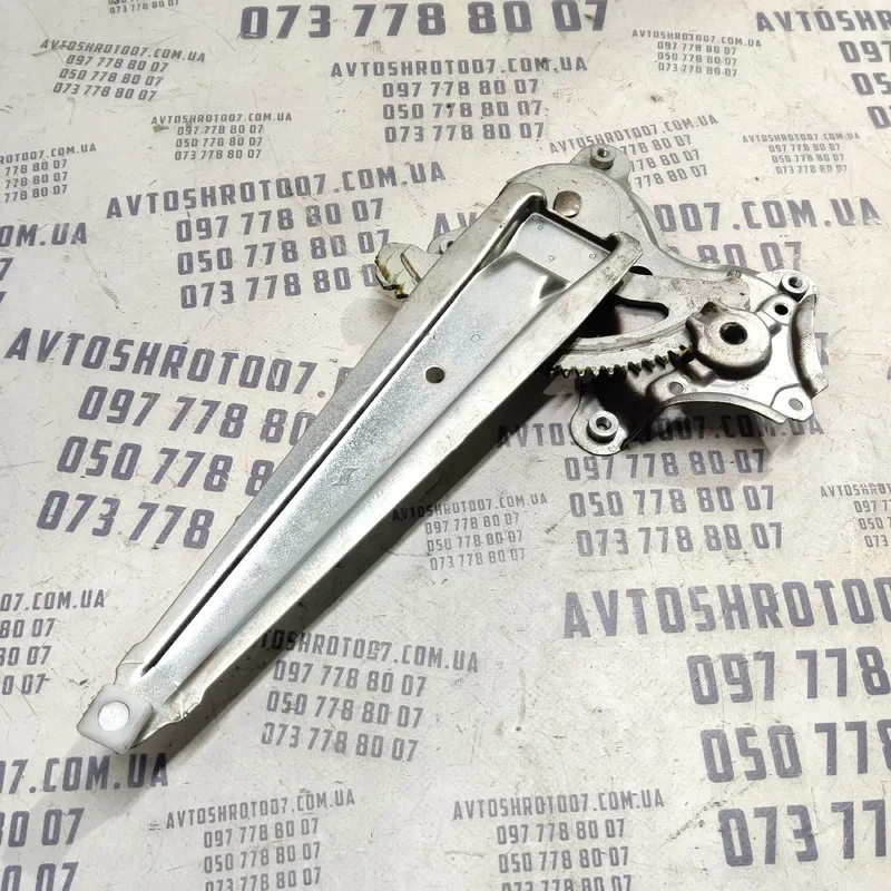 Склопідіймач Toyota Corolla 06-13 1.6 Benz зад. пр. OEM 2182