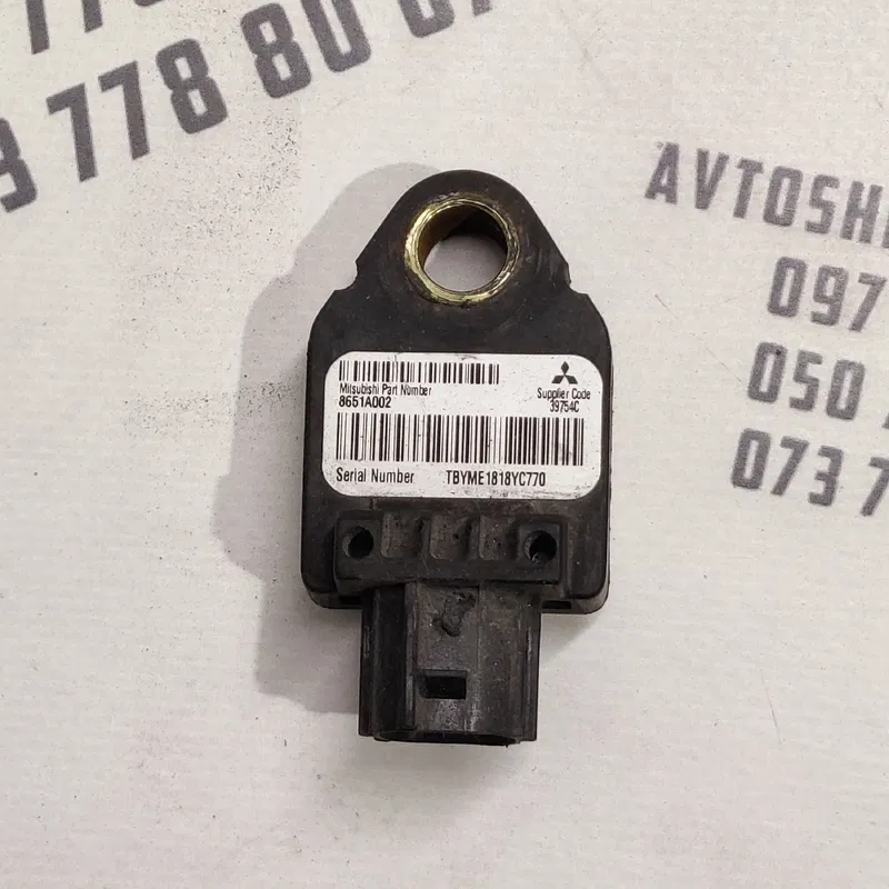 Датчик удару Mitsubishi Outlander XL 06-12 2.0d лів 8651a002