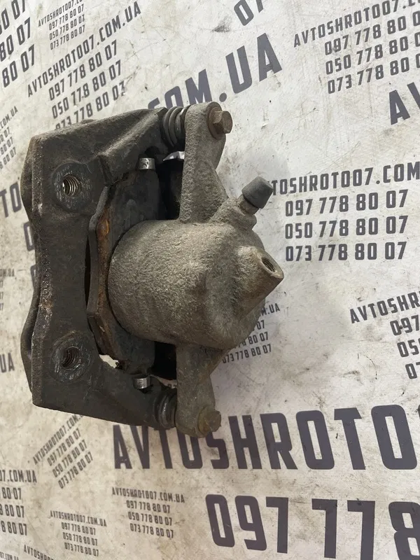 Супорт Jaguar X-Type 01-09 2.1 V6 перед. лів. OEM 0204y01128