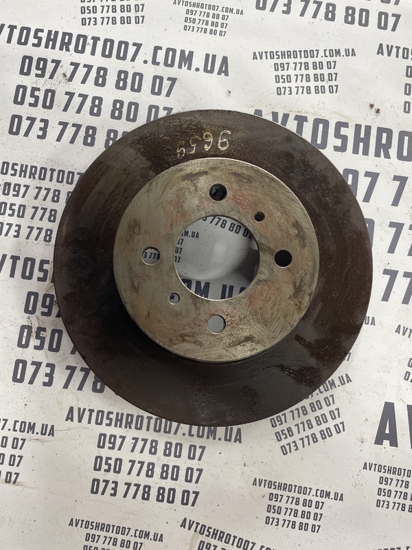 Гальмівний диск Mitsubishi Lancer 9 1.3 передній MB699285