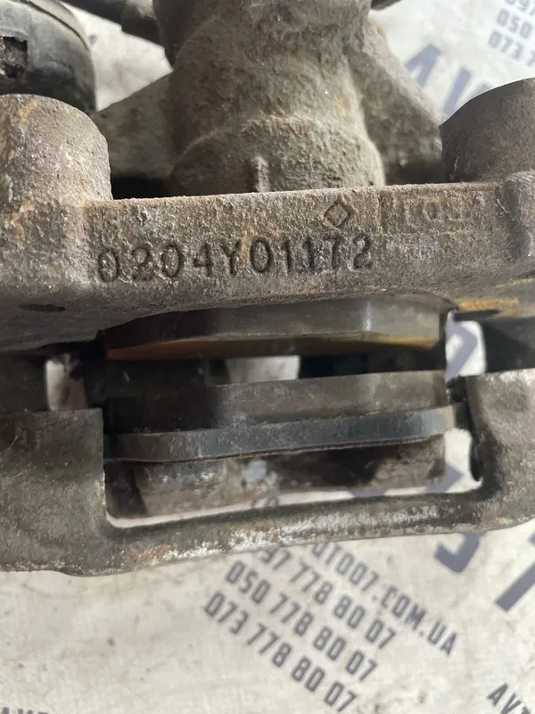 Супорт Jaguar X-Type I 01-09 2.1 V6 зад. лів. OEM 0204y01172