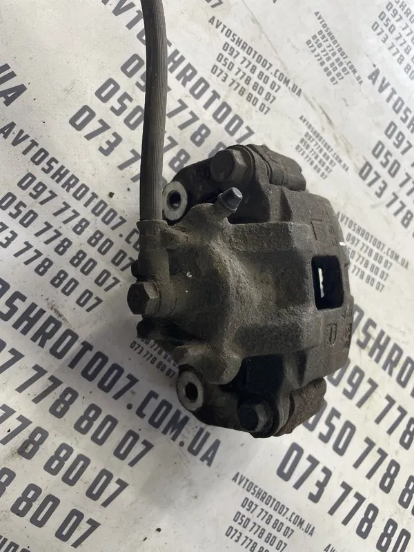 Супорт Mitsubishi Lancer 9 03-08 1.3 перед лів OEM MB950176