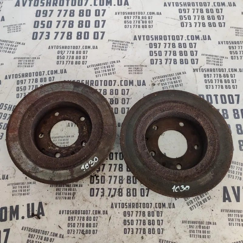 Гальмівний диск передній Ford Probe OEM 1030411O