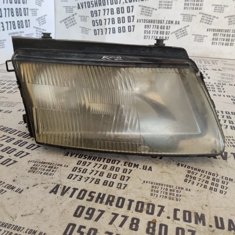 Фара Volkswagen Passat B5 (96-05) передня права OEM 14742600
