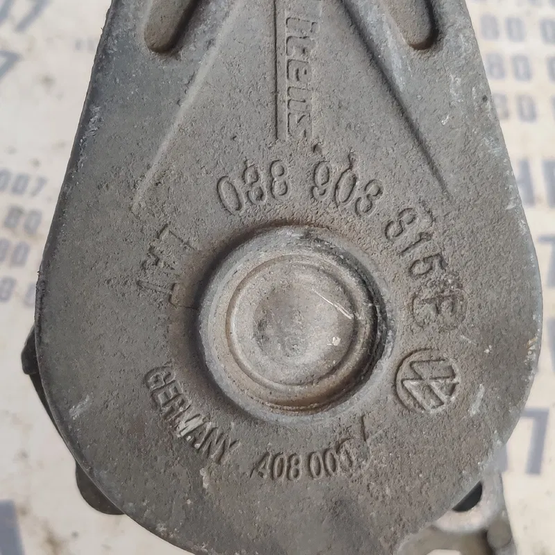 Ролик-натяжник VW Golf 4 (97-06) 1.9 TDI OEM 038903315F