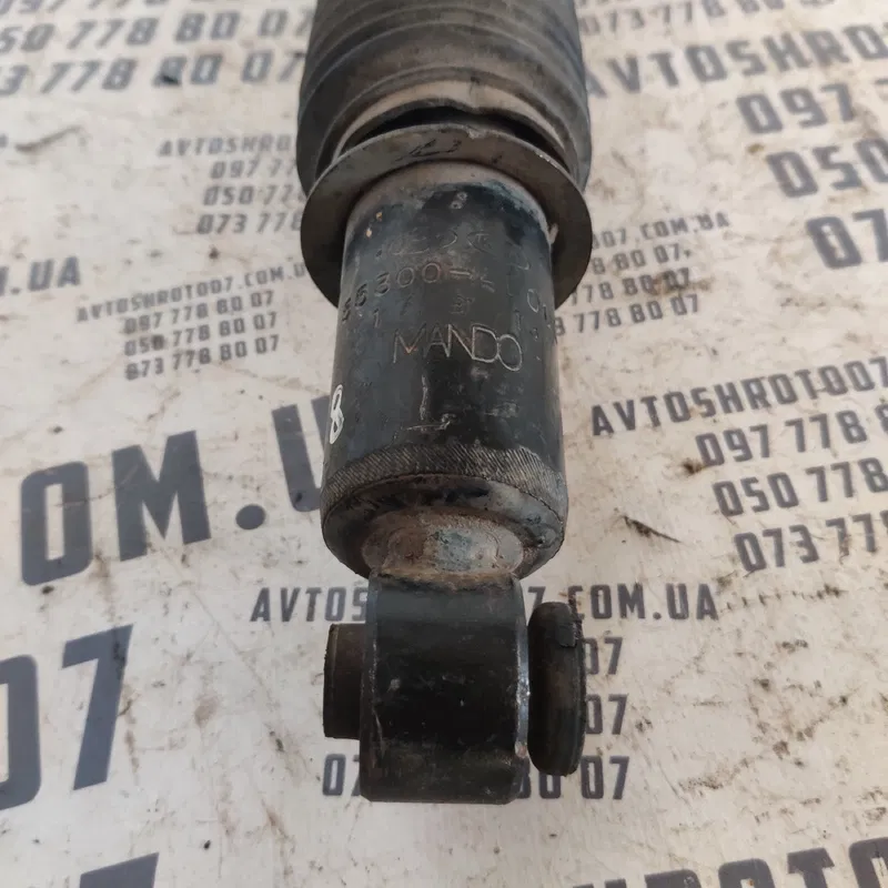 Амортизатор Hyundai Accent 3 (05-10) задній OEM 553004l000