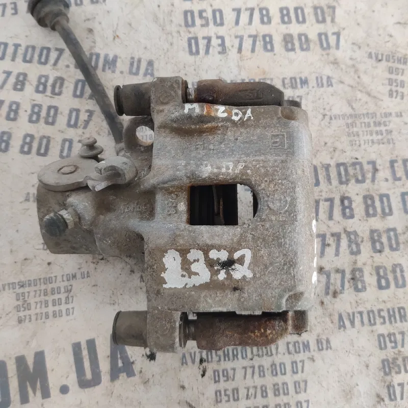 Тормозний супорт Mazda 3 BK передній правий OEM 619802H105S