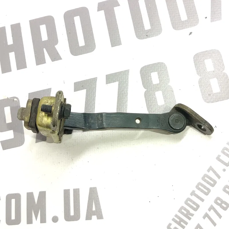 Обмежувач дверей Hyundai Elantra 3 (00-06) 1.6 передня ліва