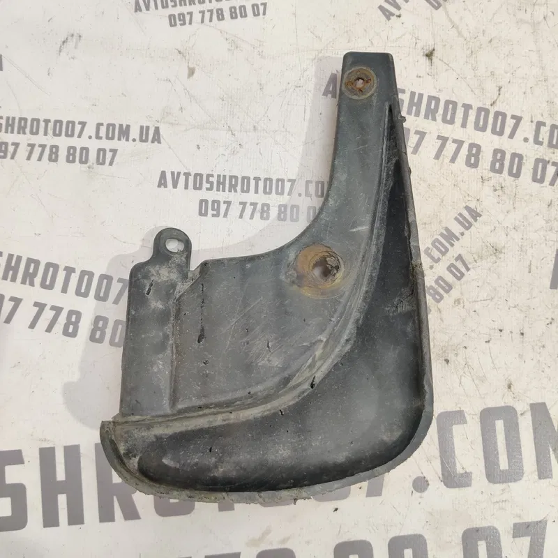 Бризговик зад. лів. Hyundai Elantra 3 (00-06) 1.6 868412d500