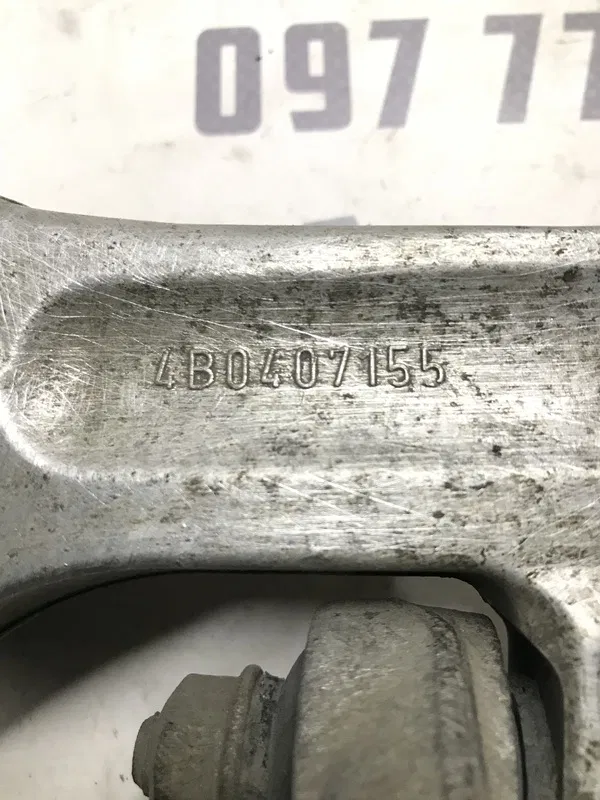 Ричаг пд.ниж.лів. VW Passat B5+ (00-05) 1.9D OEM 4b0407155