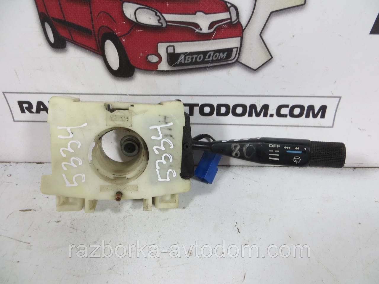 Підрулевий перемикач правий з кронштейном Nissan Bluebird T12 (1984-1990) ОЕ: 36558A32589
