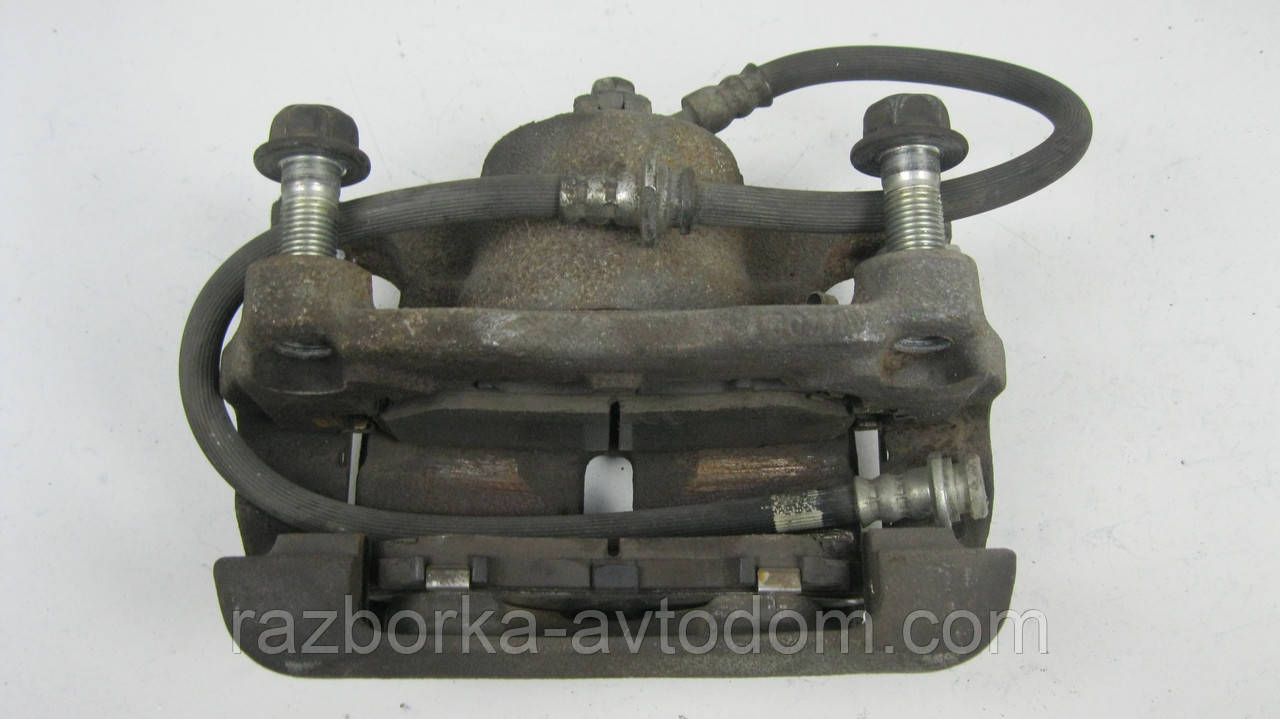 Суппорт передній правий Nissan Qashqai J10, X-Trail T31, T32, Rogue Дефект OE: 410014BA0A