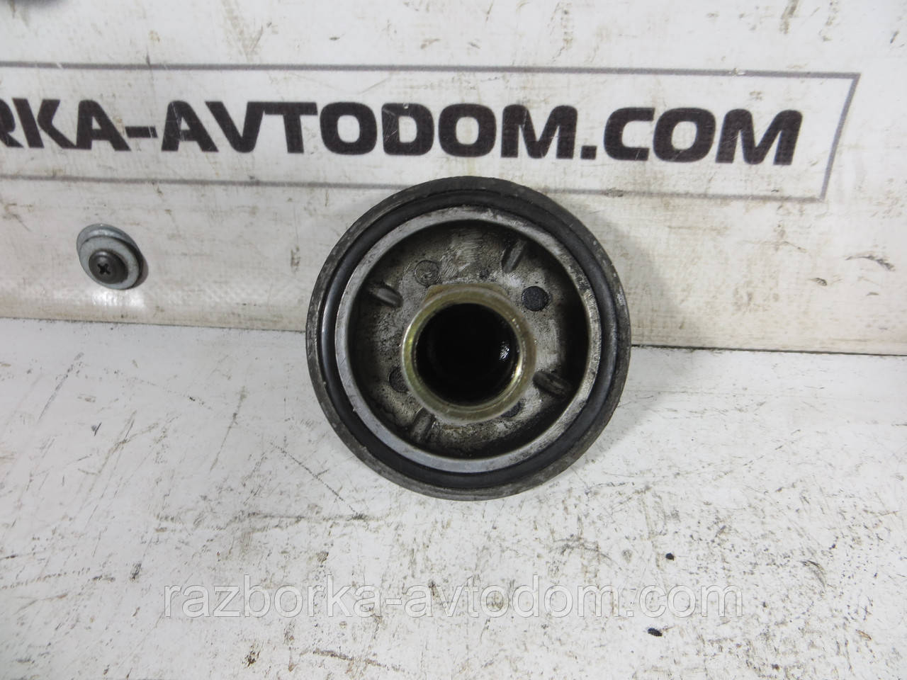 Кришка Кронштейна оливного фільтра 2.3D NISSAN VANETTE C23 (1991-2001) ОЕ: 21320D9741