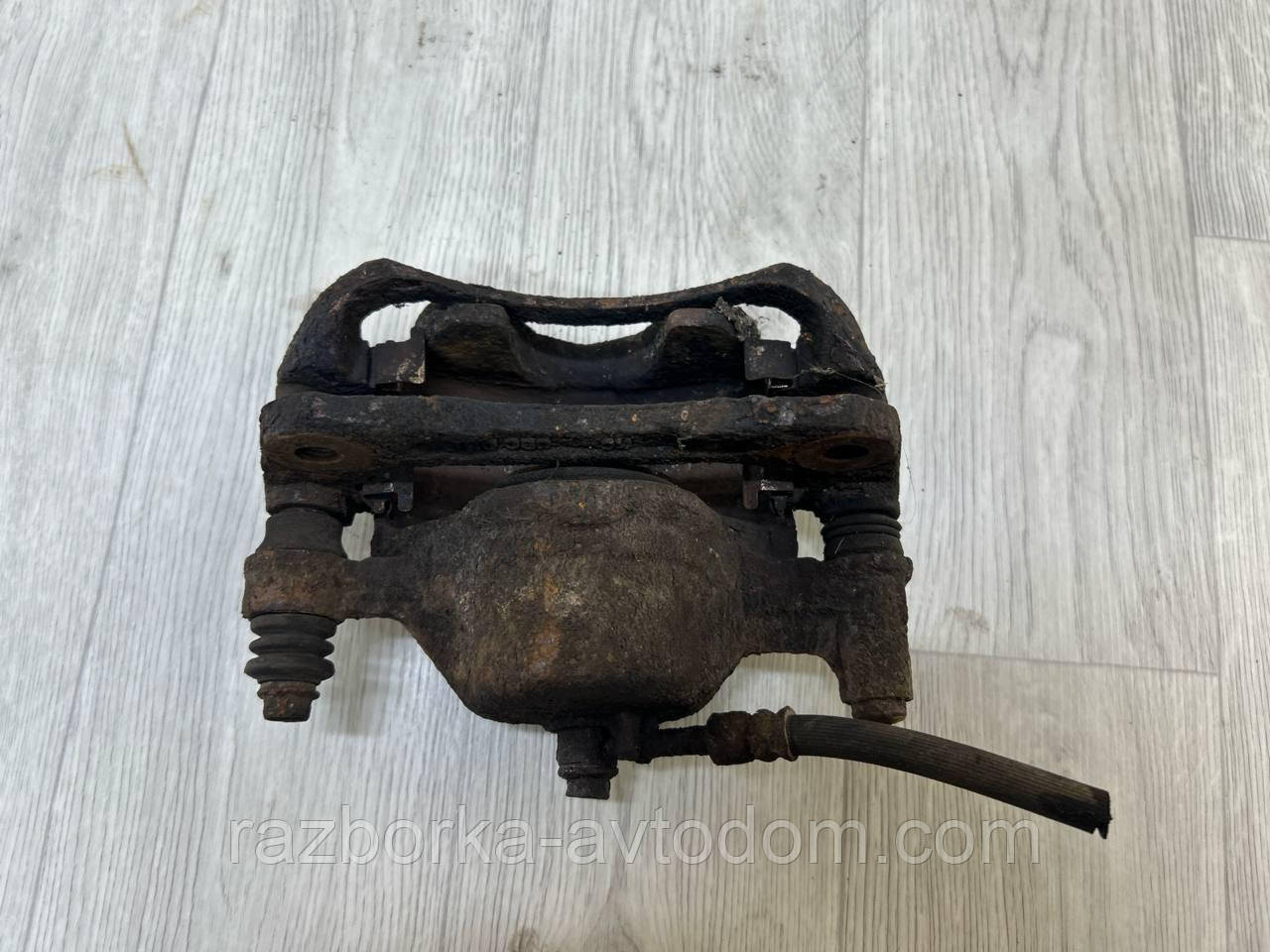 Суппорт передній лівий Hyundai Getz (02-10) OE:5818025A00