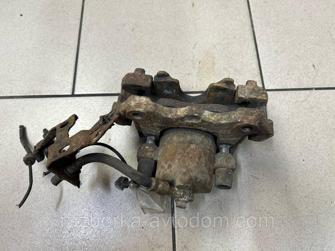 Суппорт передній правий Opel Zafira B (05-), Astra H. OE:FN357725