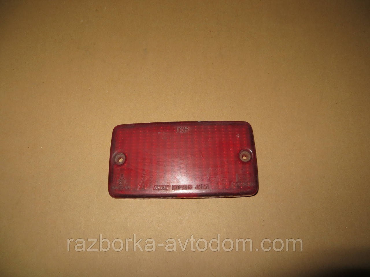 Скло фари задньої протитуманної Daihatsu Sporterak (89-92) OE:koito 236-11216