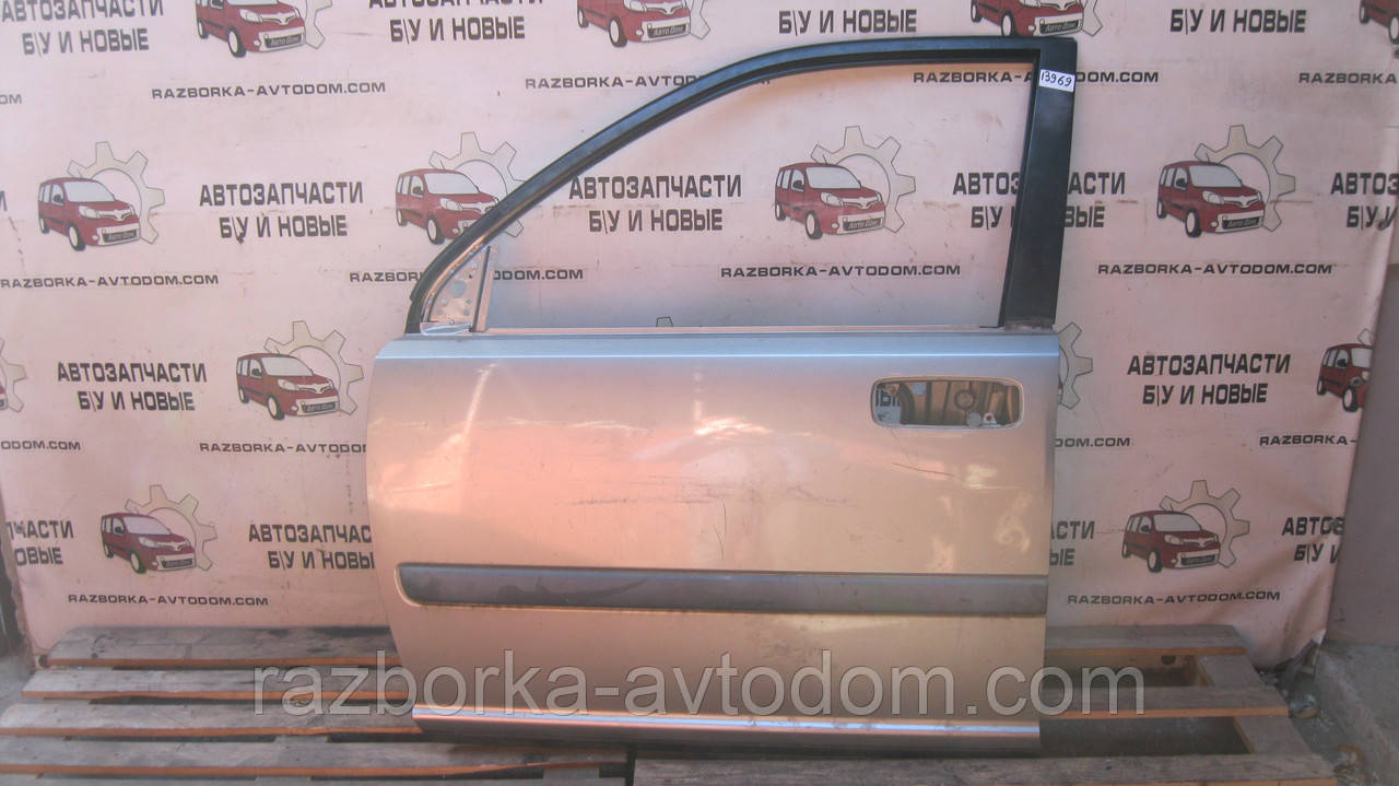 Двері передня ліва Nissan X-trail T30 (01-07) OE: H01018H7MM Дефект: подряпини та вм'ятинка незначна фото 2