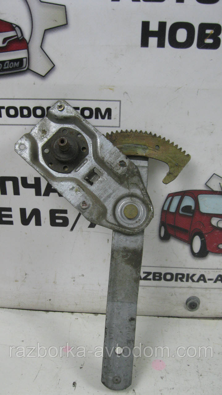 Склопідіймач задній правий (механічний) Ford Sierra (1982-1986) OE:83BB A27000 AA