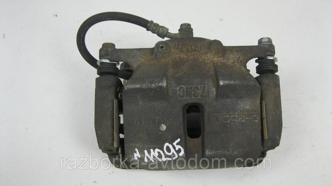 Суппорт передній правий Nissan Qashqai J10, X-Trail T31, T32, Rogue Дефект OE: 410014BA0A