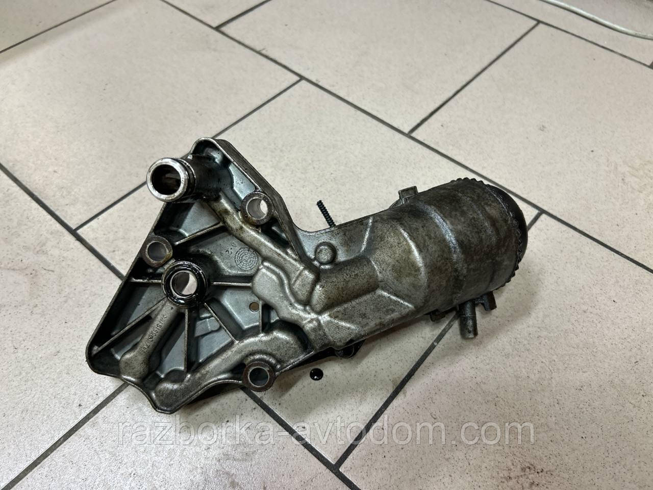 Корпус оливного фільтра 1,9CDTI Opel Zafira B (05-10) OE:6740230110