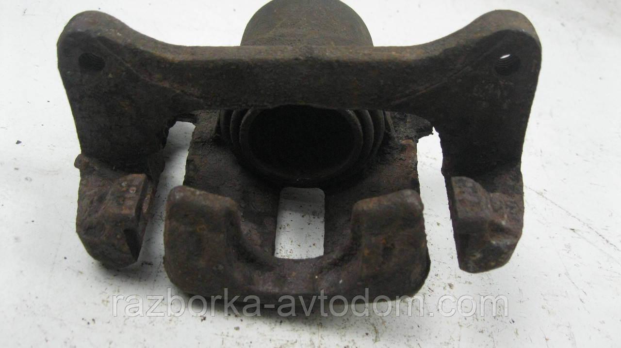 Суппорт передній правий Nissan Sunny B11 (1982-1986), B12, N13 (1986-1988) OE:4100105A90