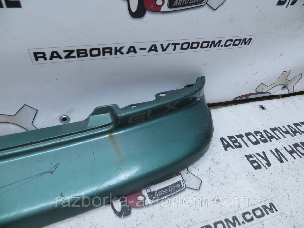 Накладка Молдинг задньої бампера (сідан) Suzuki Swift (1989-1992) OE:71811-70C00-5PK