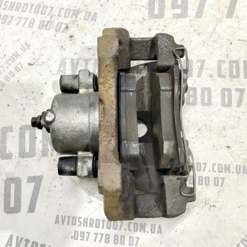 Тормозний супорт передній правий Opel Astra G (97-09) 2.0D