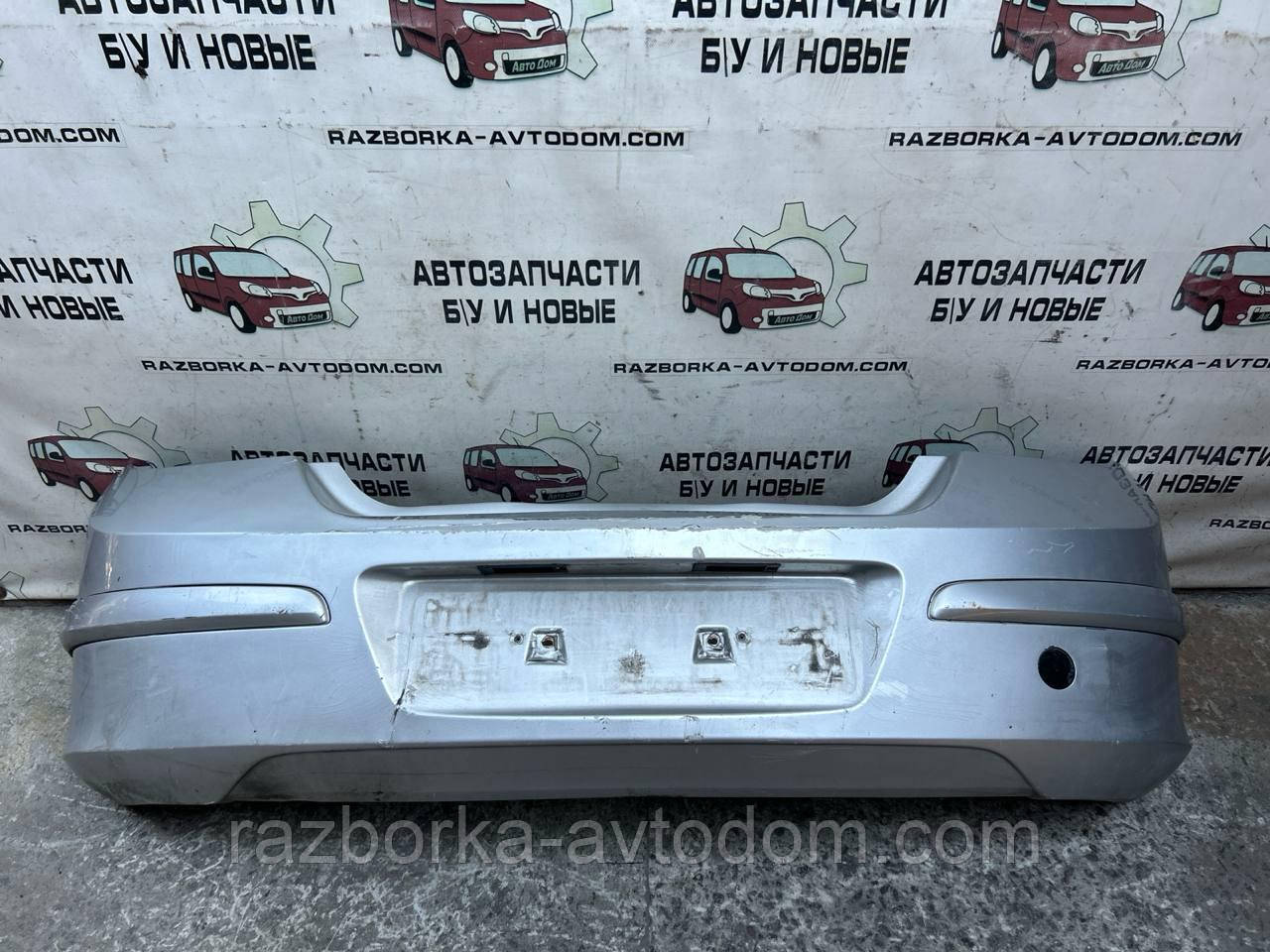 Бампер задній хетчбек OPEL ASTRA H (05-15) OE:24460353 Дефект