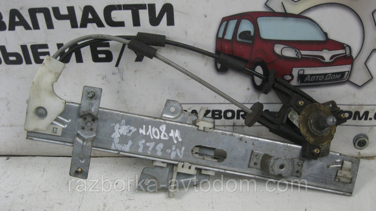 Склопідіймач задній лівий (механічний) Mazda 323 BG (1989-1994) OE:B455-73-560B фото 2