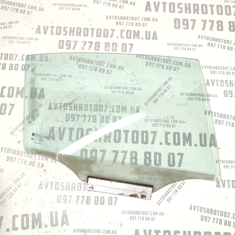 Скло дверей заднє праве Opel Astra G (97-04) 2.0D