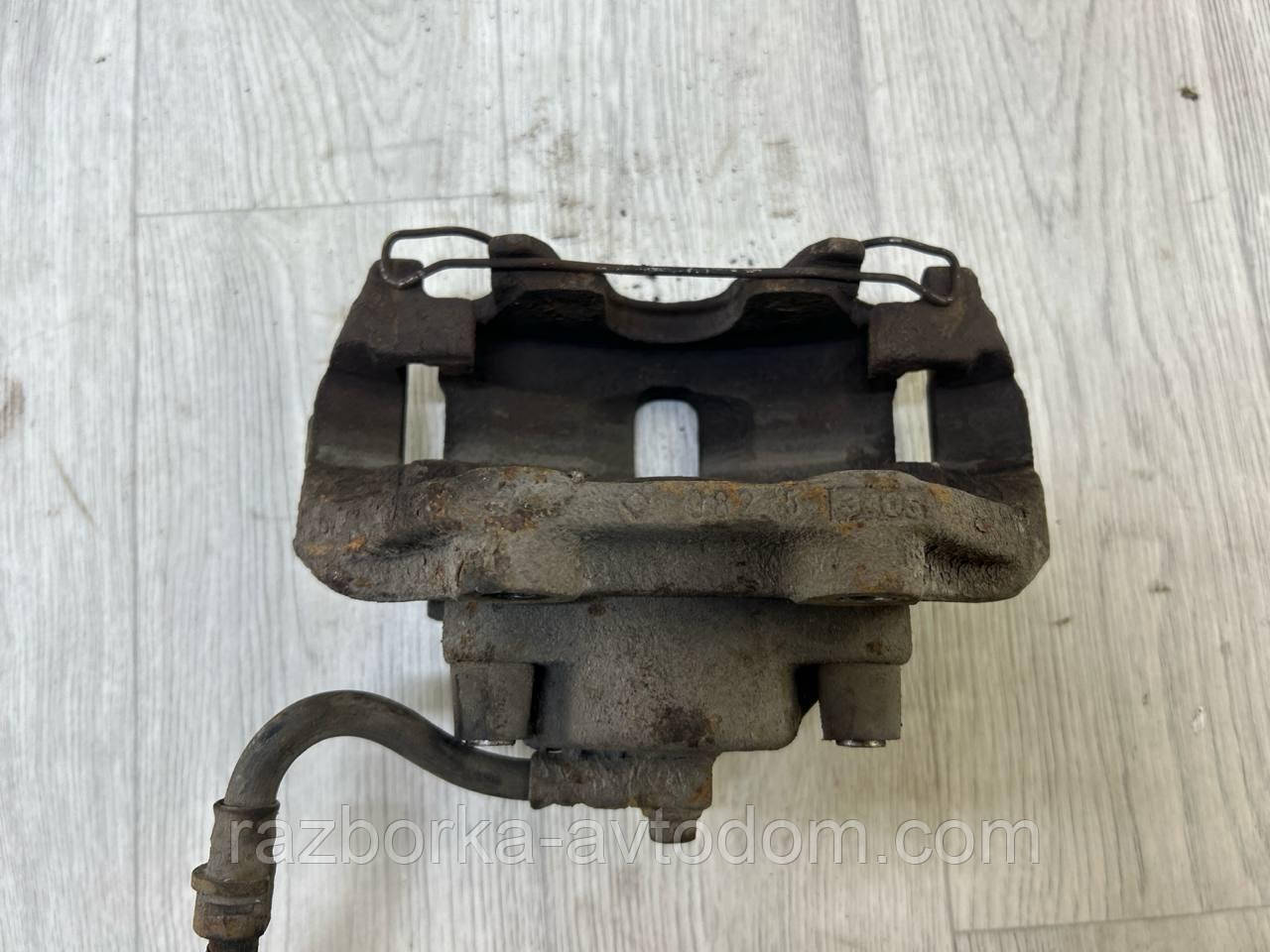 Суппорт Передній правий Opel Omega B (93-99) OE:90509197