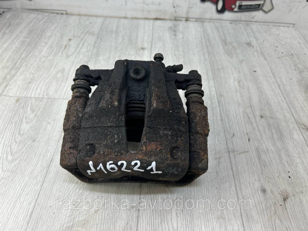 Суппорт передній лівий Opel Corsa C, Combo (01-11) OE:9196051