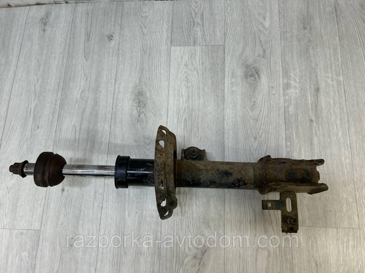 Амортизатор передній лівий Opel Astra H, Zafira B OE:24466546, 93179398
