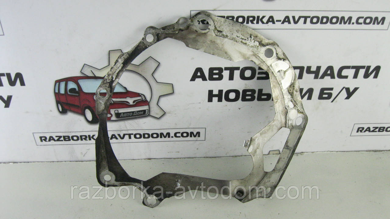 Прокладка проставка КПП (пластина, захист) VW Touran (АКПП і МКПП) (03-10) OE:038103645E